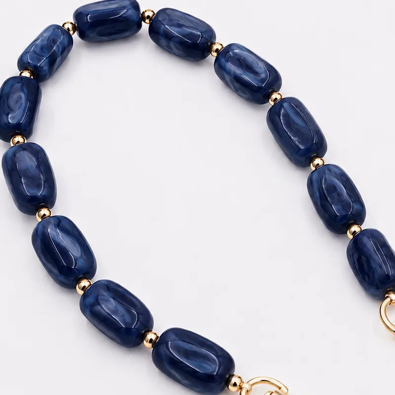 Handykette PerlenEdition Saphir — unregelmäßige Navy-Nuggets mit Goldkugeln