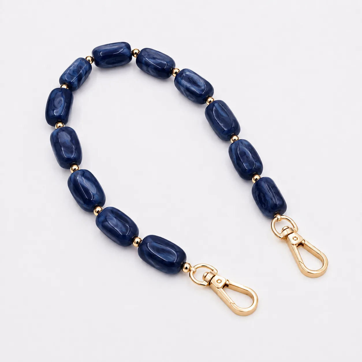 Kurze Handykette Perlen Blau — Saphir Navy mit goldenen Karabinern